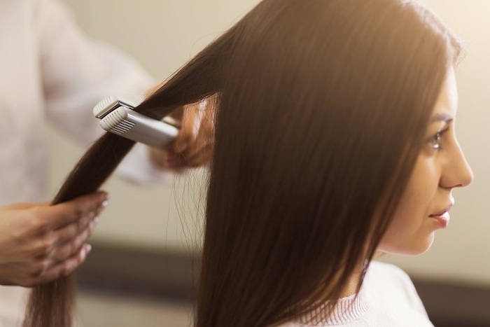 Does straightening hair kill head lice?